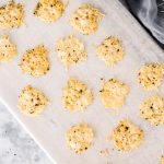 A two-ingredient recipe for Black Pepper Parmesan Crisps that are perfect for topping soup or salad or eating with dip!