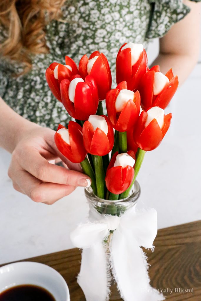 This Caprese Tulips Bouquet is made with grape tomatoes, mini mozzarella, and scallions.