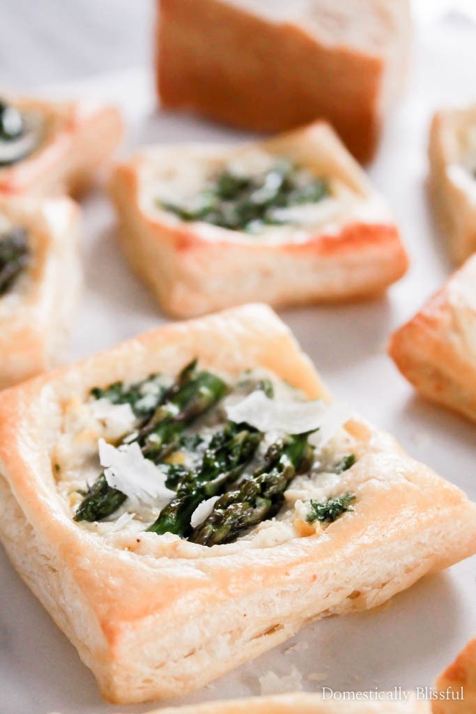 These Creamy Ricotta Asparagus Tarts are the perfect spring appetizer for your Easter party.
