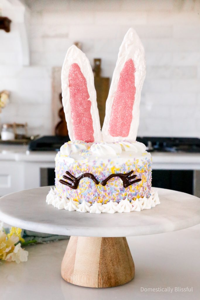 This Bunny Cake is a fun and super easy way to decorate a homemade or store-bought cake for a spring or Easter party.