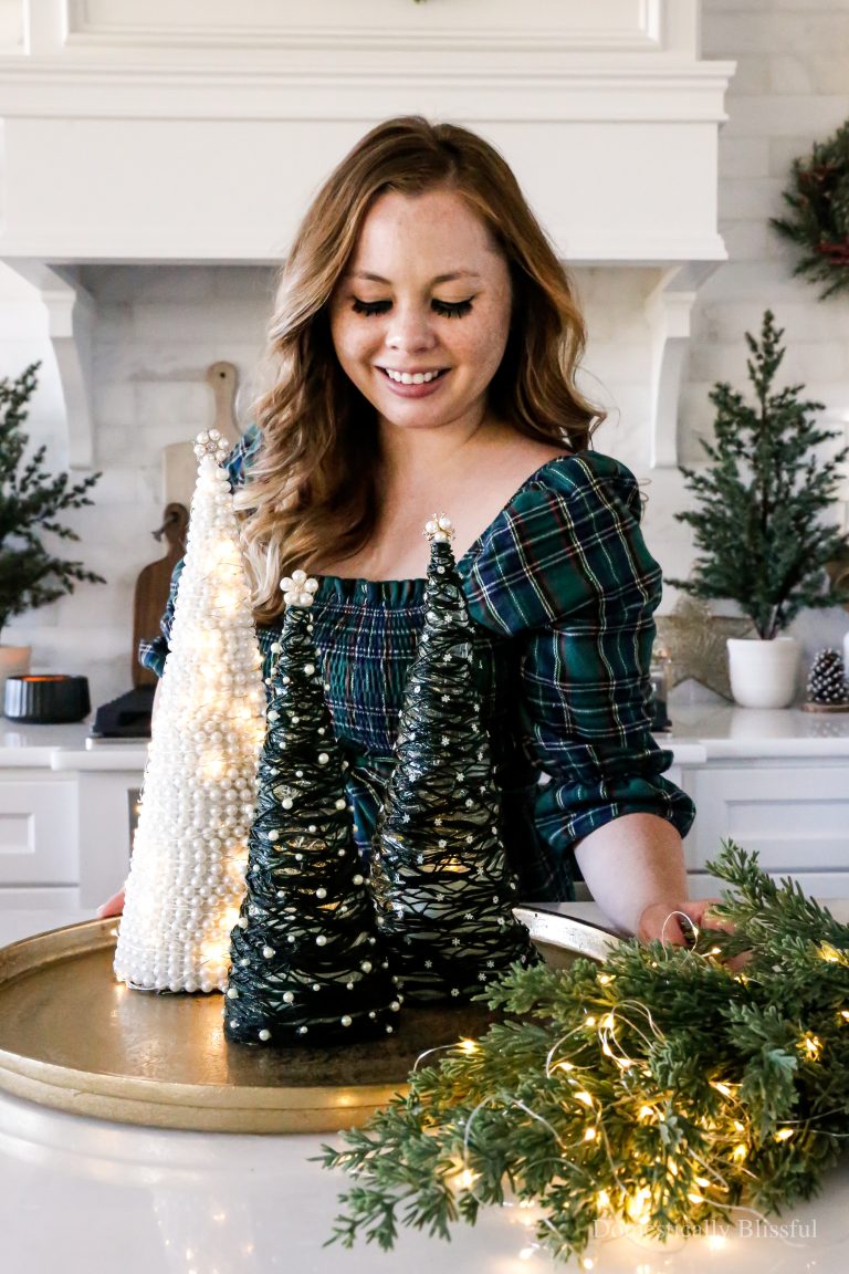 This DIY Hollow String Christmas Tree is a fun addition to holiday decor, and you can add a flameless candle or fairy lights underneath to light it up at night.