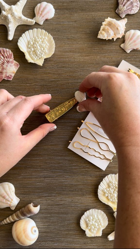 These DIY Seashell Hair Pins are a fun summer craft made with hair pins, seashells, and fake pearls.