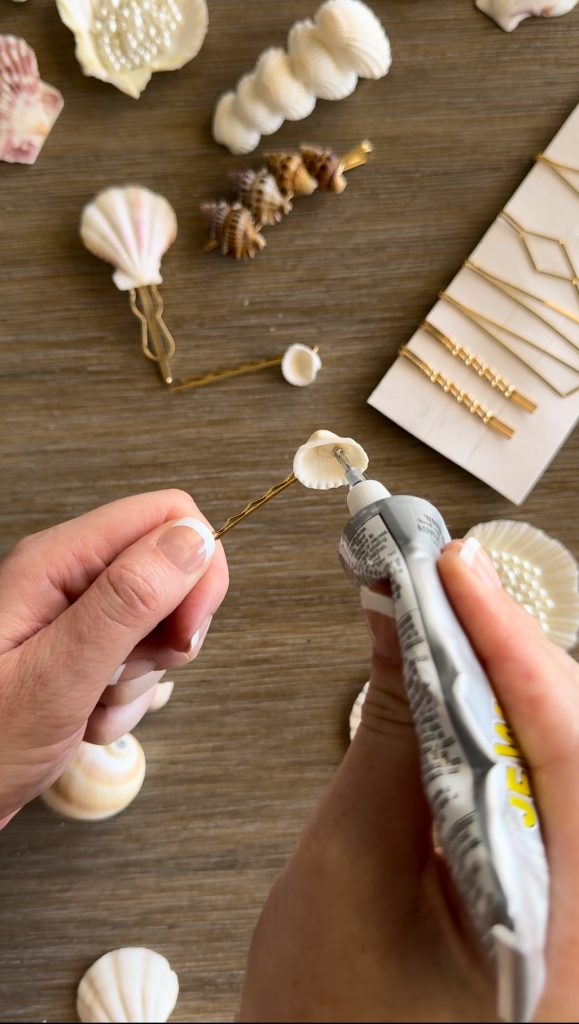 These DIY Seashell Hair Pins are a fun summer craft made with hair pins, seashells, and fake pearls.