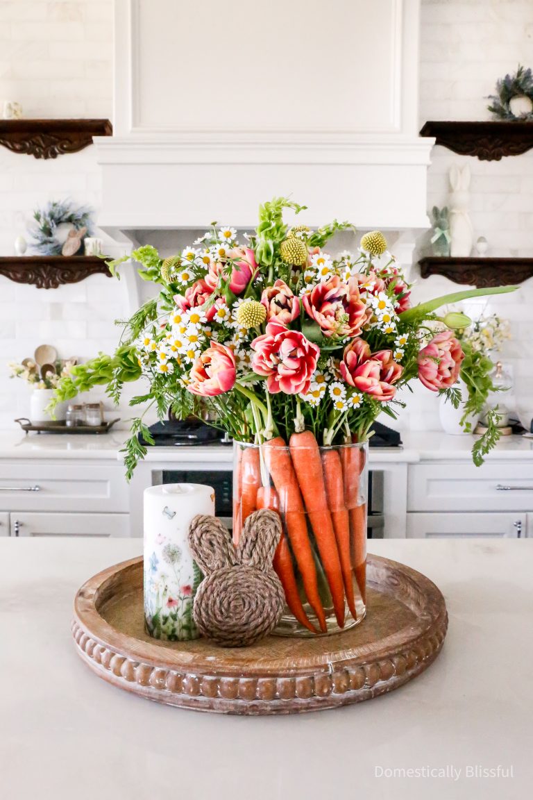 This Flower Carrot Centerpiece is a beautiful way to decorate your home for Easter and is a beautiful centerpiece for your next spring party.
