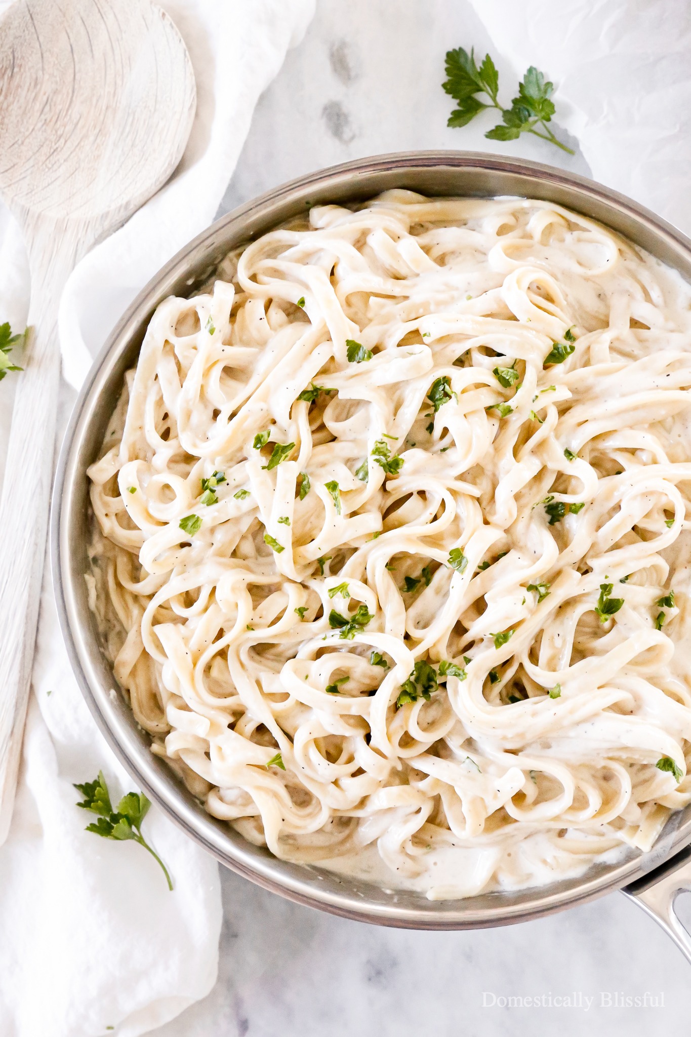This homemade Creamy Alfredo Sauce is our family's favorite and has a secret ingredient you may not expect!