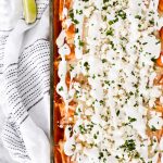 This Vegetarian Enchiladas recipe is topped with fresh flavors and filled with zucchini, broccoli, red pepper, corn, and black beans for a deliciously filling dinner.