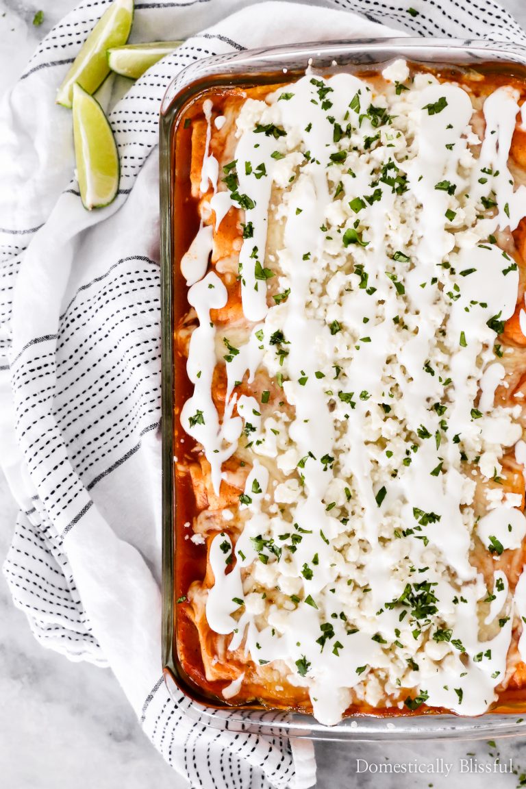 This Vegetarian Enchiladas recipe is topped with fresh flavors and filled with zucchini, broccoli, red pepper, corn, and black beans for a deliciously filling dinner.