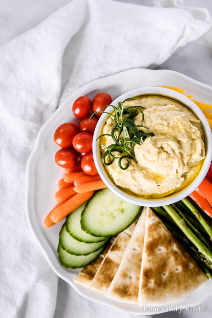 This Lemon Rosemary Hummus is bursting with fresh flavor & pairs perfectly with colorful vegetables & DASANI® Sparkling.
