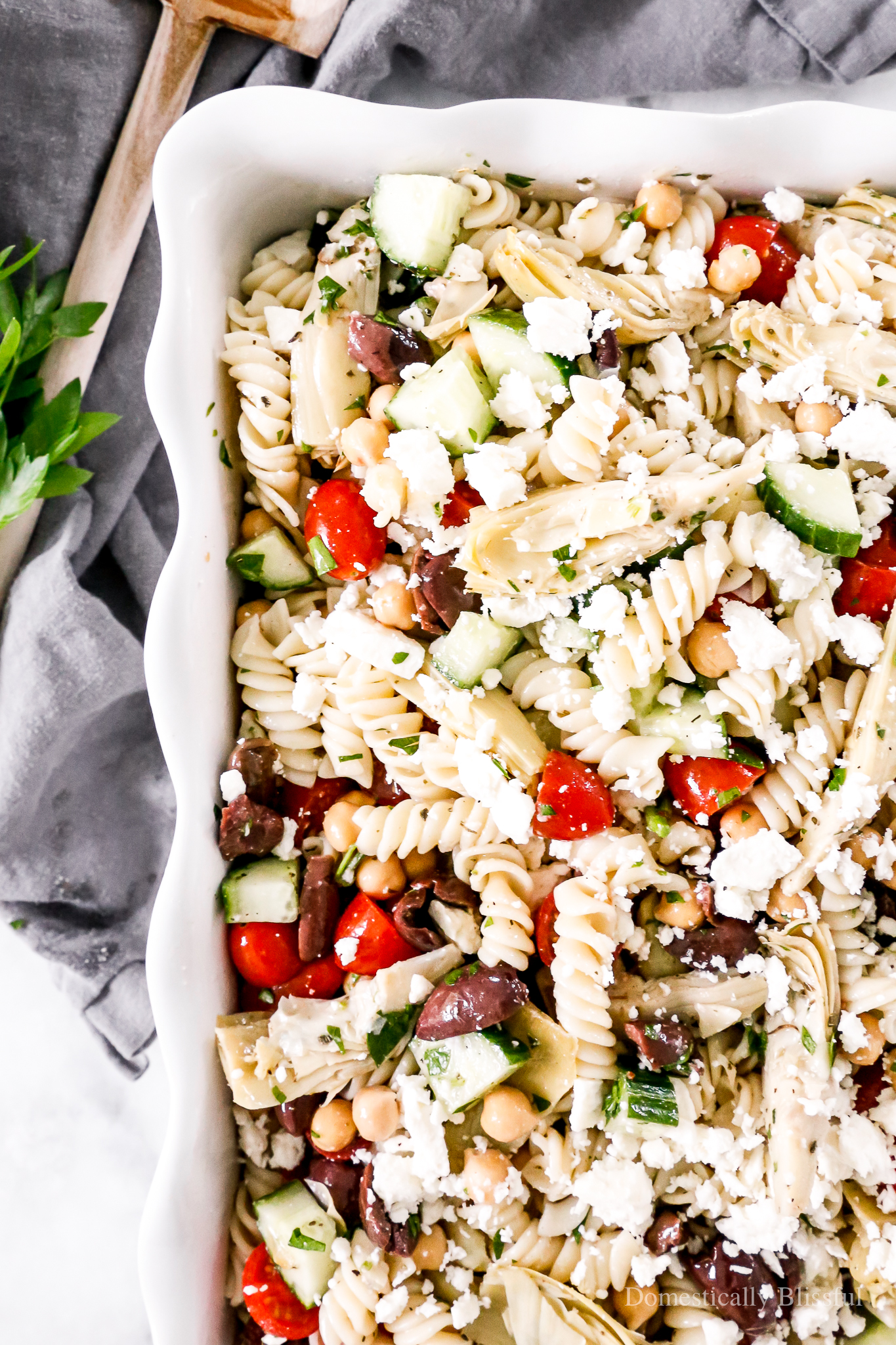 An easy Greek Pasta Salad you can make ahead of time this summer for an easy dinner or a flavorful party side dish.