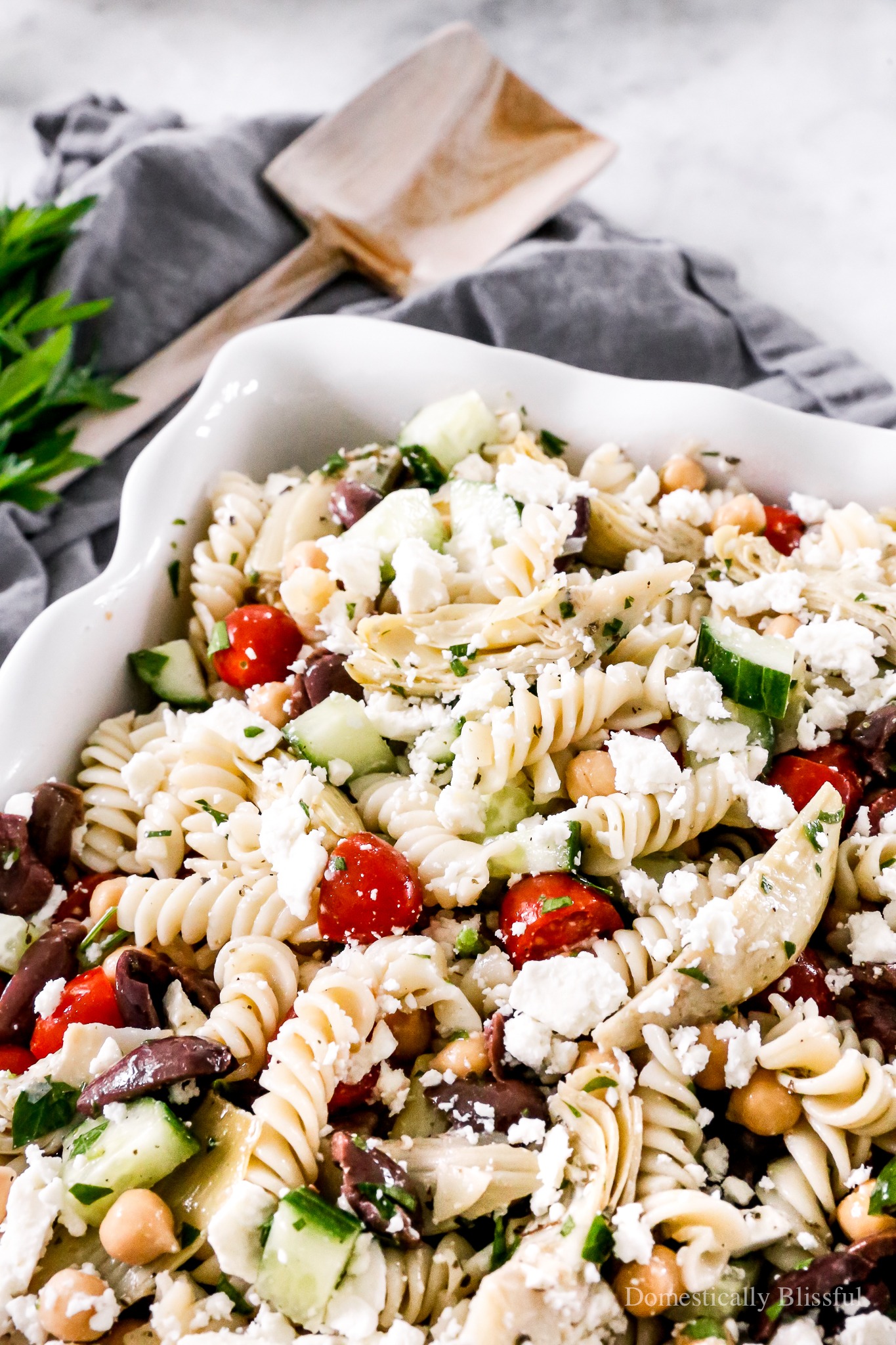 An easy Greek Pasta Salad you can make ahead of time this summer for an easy dinner or a flavorful party side dish.