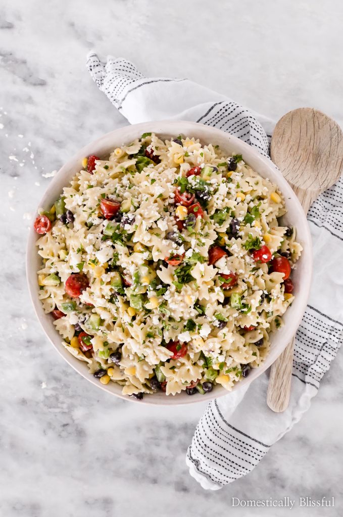 This Mexican Pasta Salad is a colorful vegetarian pasta recipe filled with fresh vegetables and topped with Panera Creamy Buttermilk Ranch+Dip at Publix.