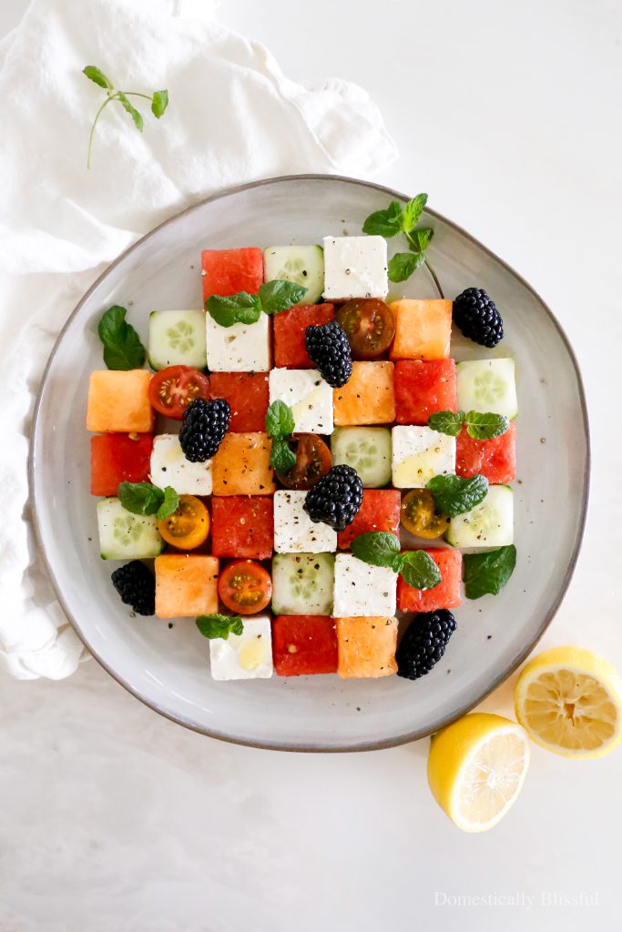 A simple Mosaic Fruit Salad that's delicious, fun for a weekend treat, and pretty to bring to a party.