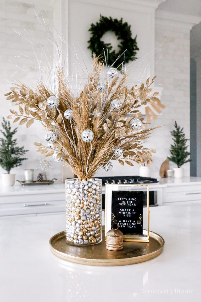 This New Year's Eve Bell Centerpiece is a fun and easy DIY with lots of glitter, twinkle lights, and bells to ring in the new year!