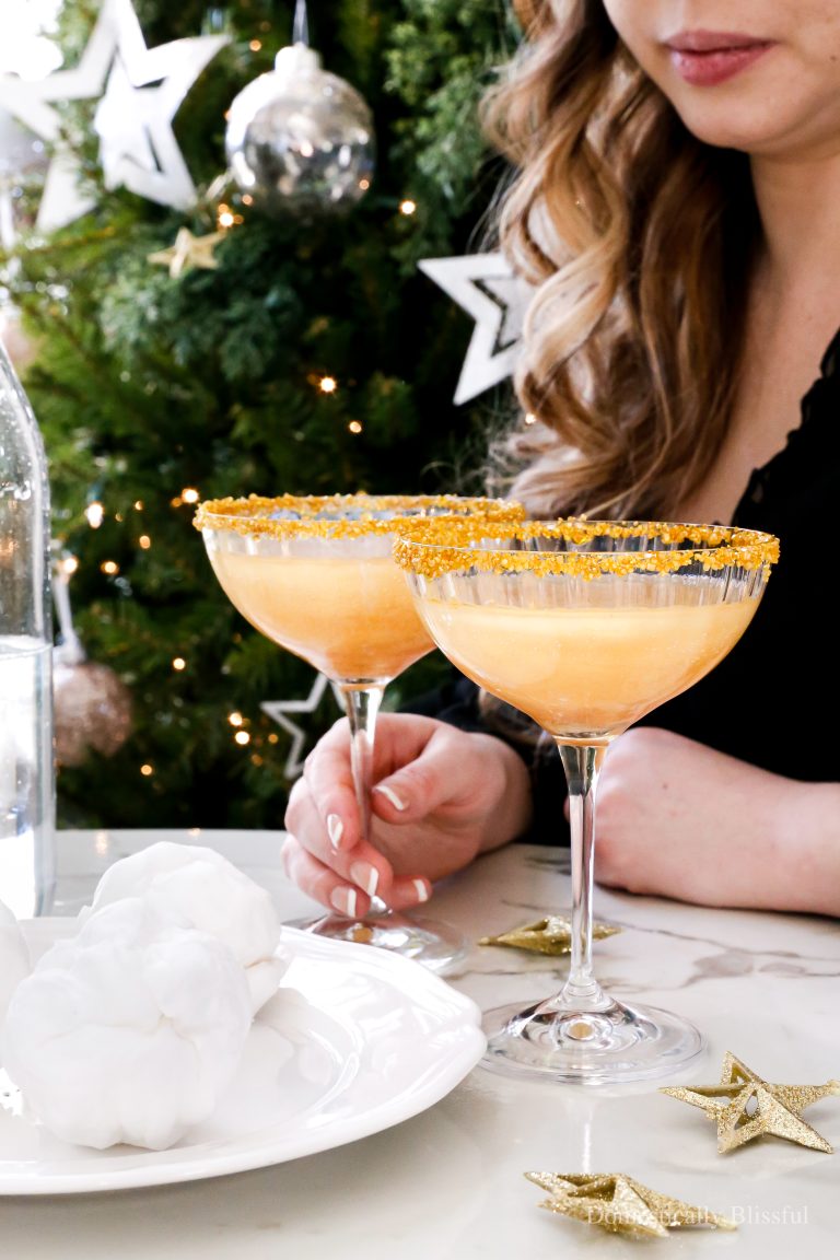 This DIY Cotton Candy Ball Drop Drink is a fun way to start the new year with edible glitter and cotton candy.