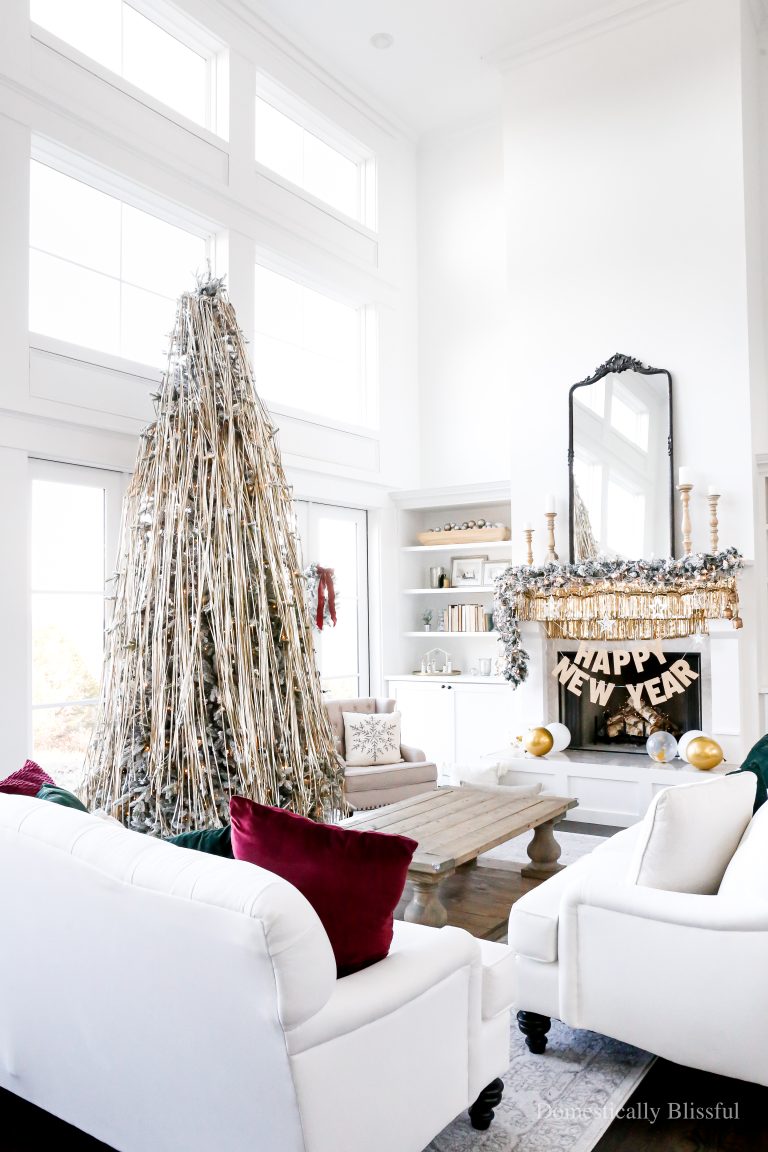 A simple New Year's Eve Tree covered in tinsel garland for a fun New Year's Eve party.