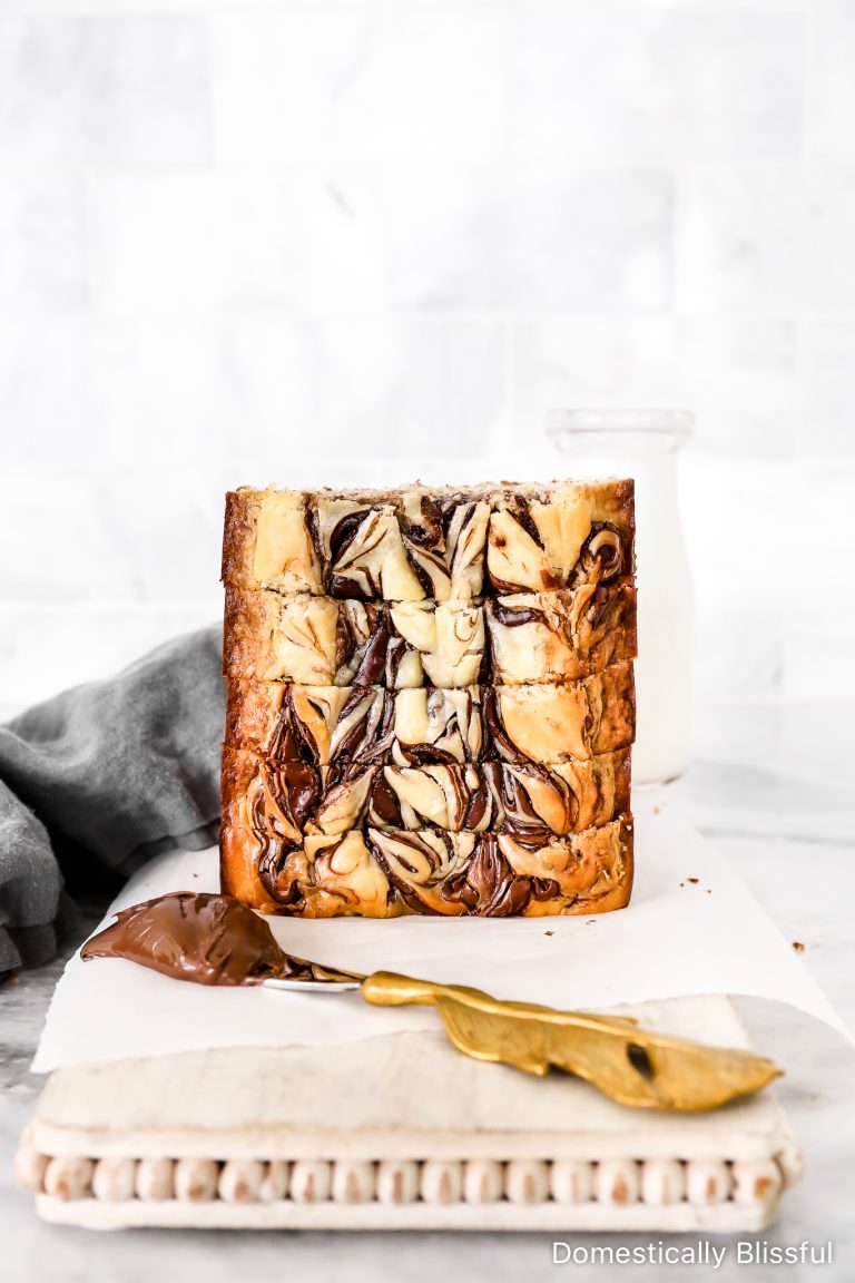 This Nutella Cream Cheese Swirl Banana Bread is sweet, moist, and has all the decadent flavors of a breakfast dessert.