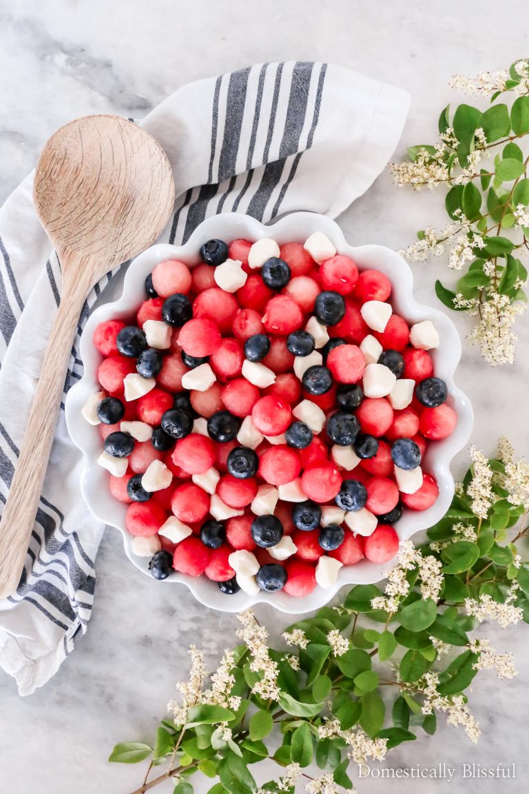 This Patriotic Fruit Caprese is a fun way to enjoy your favorite summer fruit and mini mozzarella balls on the 4th of July.