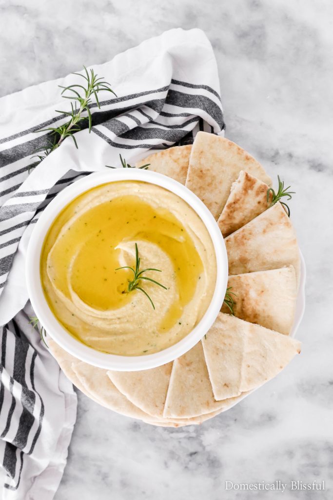 You only need 6 ingredients (no tahini) for this creamy Roasted Garlic Rosemary Hummus!