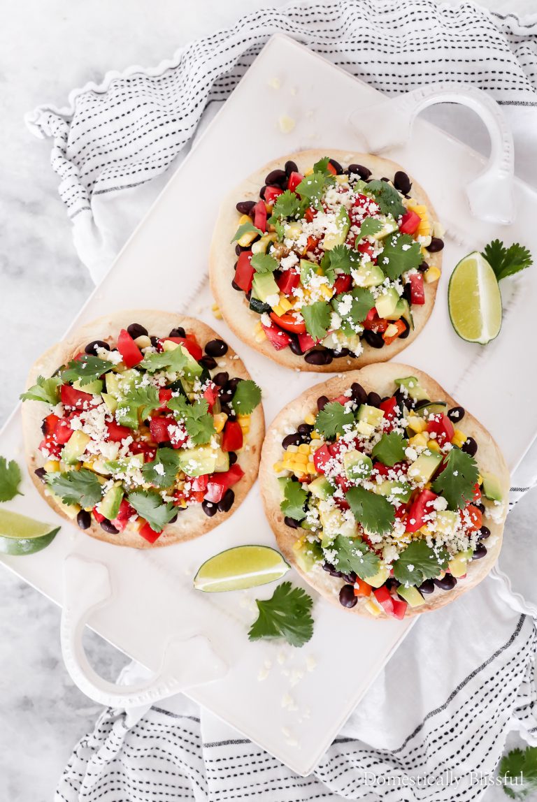 These Roasted Vegetable Tostadas are a quick & easy dinner recipe full of fresh flavor that takes less than 30 minutes to create.