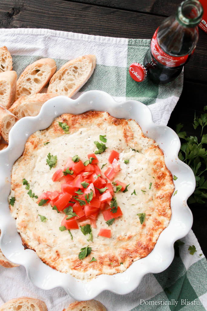 This Smoked Mozzarella Dip is filled with creamy flavors & is the perfect warm appetizer for any party or family gathering!