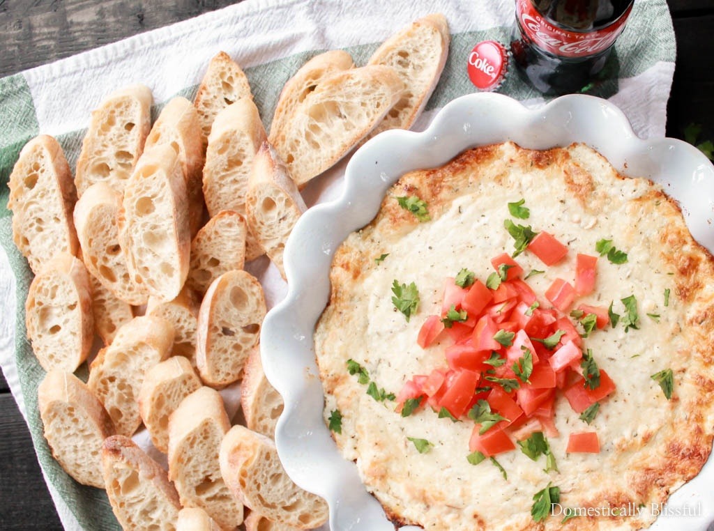 This Smoked Mozzarella Dip is filled with creamy flavors & is the perfect warm appetizer for any party or family gathering!