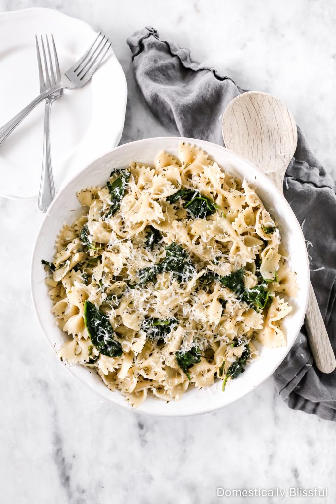 This Spinach Artichoke Pasta is an easy dinner recipe that is quick enough for a weeknight, yet so full of delicious flavors it is perfect for a dinner party.