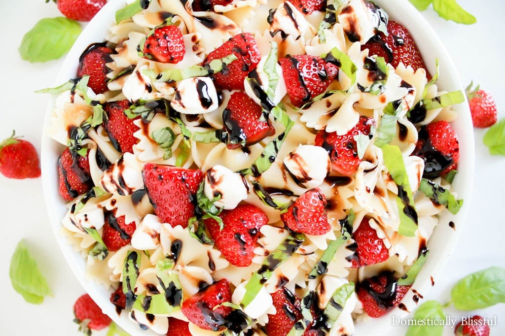 Strawberry Caprese Pasta Salad is overflowing with fresh flavor & is the perfect addition to any summer meal!