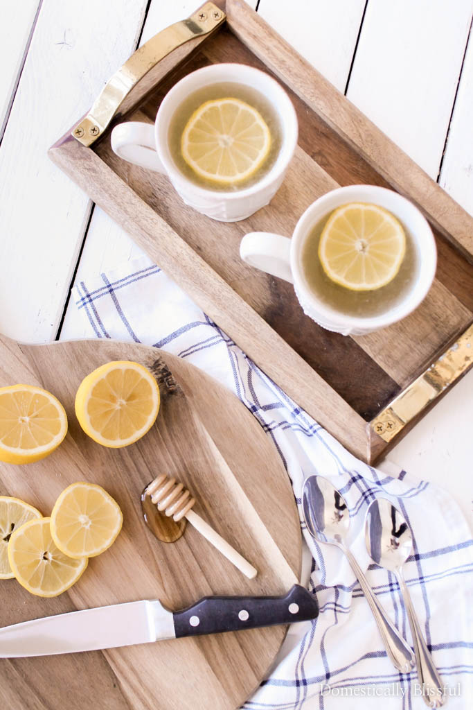 Warm Lemon Honey Water is the perfect drink to warm you up & soothe your sore throat on a cold winter day.