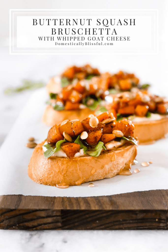 This Whipped Goat Cheese Butternut Squash Bruschetta begins with sliced toasted baguette, topped with whipped goat cheese, arugula, roasted butternut squash, honey, and pumpkin seeds.  