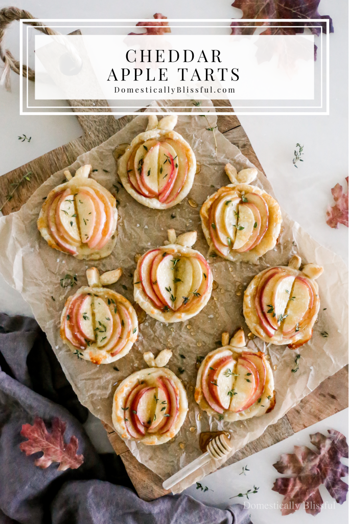 These cheesy Cheddar Apple Tarts are a savory treat perfect for fall parties, Friendsgiving gatherings, or Thanksgiving.