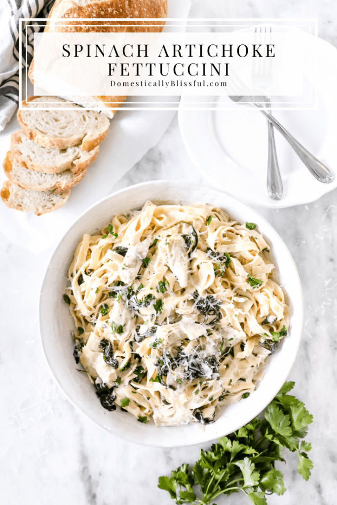This Spinach Artichoke Fettuccini is made with fresh fettuccini topped with a creamy sauce filled with marinated artichoke hearts and spinach and topped with fresh parsley and grated parmesan.