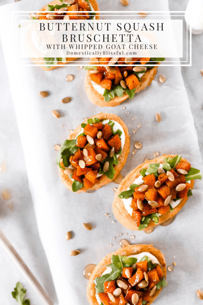 This Whipped Goat Cheese Butternut Squash Bruschetta begins with sliced toasted baguette, topped with whipped goat cheese, arugula, roasted butternut squash, honey, and pumpkin seeds.  